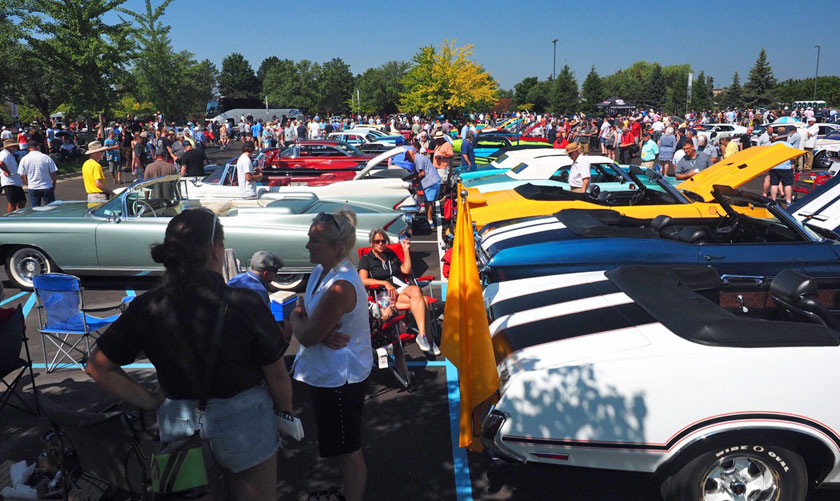Cars crowded on parking lot.